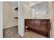 Bathroom vanity features a mirror, sink, and storage drawers at 7448 Grand Ct, Winter Park, FL 32792