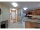 Entryway with a granite breakfast bar that overlooks the kitchen at 7449 Sugar Bend Dr # 7449, Orlando, FL 32819