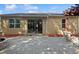 Backyard with a paved patio, fire pit, and wooden pergola attached to the house with sliding glass doors at 981 Galway Blvd, Apopka, FL 32703