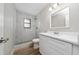 Bathroom featuring a stand up shower, neutral walls, and stylish vanity at 986 Sweetbrier Dr, Deltona, FL 32725