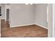 Open dining room featuring wood-look flooring, neutral paint and ample natural light at 1010 Corbin Ct, Oviedo, FL 32765