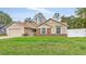Charming home with a well-maintained lawn, appealing brick accents, and a cozy, inviting aesthetic at 1010 Corbin Ct, Oviedo, FL 32765