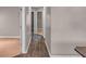 A hallway connecting different areas of the home with modern flooring at 1010 Corbin Ct, Oviedo, FL 32765