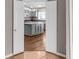 Featuring an island and gray cabinetry, this kitchen has a modern look at 1010 Corbin Ct, Oviedo, FL 32765