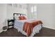 Cozy bedroom with hardwood floors, shuttered window and natural light at 11327 Ledgement Ln, Windermere, FL 34786