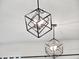 Modern cube lighting fixtures hanging from a white ceiling at 11327 Ledgement Ln, Windermere, FL 34786