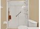 Bathroom showcasing a shower with glass doors and a convenient fold down seat at 123 Avenham Drive, Deland, FL 32724