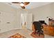 Bedroom with ceiling fan and a view of the attached bathroom at 123 Avenham Drive, Deland, FL 32724