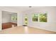 Dining area with tile floors, a view of the yard, and an open floor plan at 1307 Lindenwood Ln, Winter Park, FL 32792