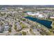 An aerial view of the residential community, showcasing the picturesque lake and well-maintained landscaping at 13101 Summerton Dr, Orlando, FL 32824