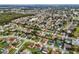 Community aerial view, showing verdant, tree-lined neighborhood at 14923 Day Lily Ct, Orlando, FL 32824