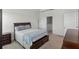 Bedroom with a Queen bed and a nightstand at 2258 Sedge Grass Way, Orlando, FL 32824