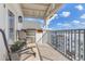 Balcony featuring an outdoor grill and chairs with an open view of the city at 2305 Edgewater Dr # 1701, Orlando, FL 32804