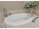 Close up of a modern bathtub with jets at 2305 Edgewater Dr # 1701, Orlando, FL 32804