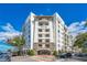 Beautiful exterior of the condo building featuring balconies and a stone archway entrance at 2305 Edgewater Dr # 1701, Orlando, FL 32804