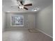 Bright room featuring a large bay window for natural light and tile flooring at 250 Douglas Dr, Eustis, FL 32726