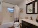 Cozy bathroom featuring modern fixtures, decor, and a shower at 2600 Musselwhite Ave, Orlando, FL 32804