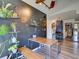 An eclectic dining area has bench seating and a chalkboard wall in this vibrant living space at 2600 Musselwhite Ave, Orlando, FL 32804