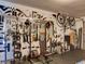 Home gym with weight training equipment and mounted bicycles. Mirrors on the wall at 2600 Musselwhite Ave, Orlando, FL 32804