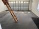 Garage with an overhead ladder at 2628 Caribe Dr, The Villages, FL 32162