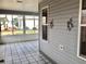 Enclosed patio with tiled floor provides an outdoor living space at 2628 Caribe Dr, The Villages, FL 32162