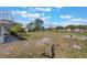 Expansive backyard with a fire pit and plenty of room for outdoor activities at 2662 Hibiscus Ct, Deltona, FL 32738