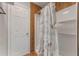 Bathroom featuring stylish Paris themed shower curtain and tile surround at 2662 Hibiscus Ct, Deltona, FL 32738