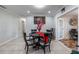 Bright dining area features neutral walls, tile floors, and seamless flow to the living room at 2662 Hibiscus Ct, Deltona, FL 32738