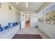 View of the sunroom leading to the dining area, showing off natural light at 2662 Hibiscus Ct, Deltona, FL 32738