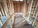 View of bathroom framing showing plumbing and potential layout for sink, toilet and shower at 30117 Misty Pines Rd, Mount Dora, FL 32757