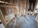 Under-construction plumbing and ventilation framework with wooden supports is visible prior to drywall installation at 30120 Misty Pines Rd, Mount Dora, FL 32757