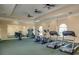 A spacious gym with multiple treadmills, elliptical machines, and exercise equipment at 3177 Feltrim Pl # 304, Kissimmee, FL 34747