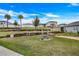 Outdoor exercise equipment in a well-maintained community park at 3871 Brant Pl, Leesburg, FL 34748