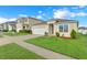 Attractive one-story home features a two-car garage, manicured lawn, and welcoming curb appeal in a Gathering-friendly area at 3871 Brant Pl, Leesburg, FL 34748