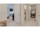 Hallway featuring access to a bedroom, toilet, and closet at 3871 Brant Pl, Leesburg, FL 34748