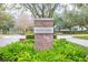 The Baldwin Park community entrance sign nestled in lush, manicured landscaping at 4268 Ethan Ln, Orlando, FL 32814