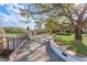 Picturesque walkway with mature trees and manicured landscaping in a serene community setting at 4268 Ethan Ln, Orlando, FL 32814