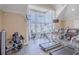 Spacious fitness center with modern exercise equipment and large windows for natural light at 4268 Ethan Ln, Orlando, FL 32814