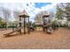 Community playground with slides, climbing structures, and soft landing mulch at 4268 Ethan Ln, Orlando, FL 32814