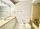 Bathroom featuring a vanity, sink, toilet, and a tub/shower combo at 4439 Pinebark Ave # 47-4, Orlando, FL 32811