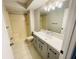 Bathroom featuring a vanity with drawers, shower and neutral color palette at 4439 Pinebark Ave # 47-4, Orlando, FL 32811
