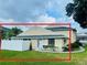 Charming condo exterior with well-maintained lawn, a front door and white picket fence for privacy at 4439 Pinebark Ave # 47-4, Orlando, FL 32811
