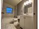 Bathroom featuring tub, vanity and tiled floors at 4900 Grand Ave, De Leon Springs, FL 32130