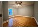 Cozy bedroom with natural light and hardwood floors at 4900 Grand Ave, De Leon Springs, FL 32130