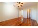 Bright bedroom with hardwood floors and closet with ample storage space at 5550 E Michigan St # 3309, Orlando, FL 32822