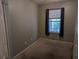 Modest bedroom with a window offering views and neutral wall paint at 570 Cranes Way # 246, Altamonte Springs, FL 32701