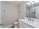 Bathroom featuring white marble shower, new fixtures, a vanity, and neutral wall paint at 605 Hill Ave, Ocoee, FL 34761