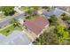 Aerial view of house with brown roof and green landscaping at 6385 Royal Tern St, Orlando, FL 32810