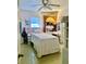 Charming bedroom featuring a unique headboard, ample closet space and natural light at 701 S Delaware Ave, Deland, FL 32720