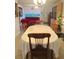 Bright dining room featuring a large table perfect for gatherings, seamlessly connected to the living area at 701 S Delaware Ave, Deland, FL 32720